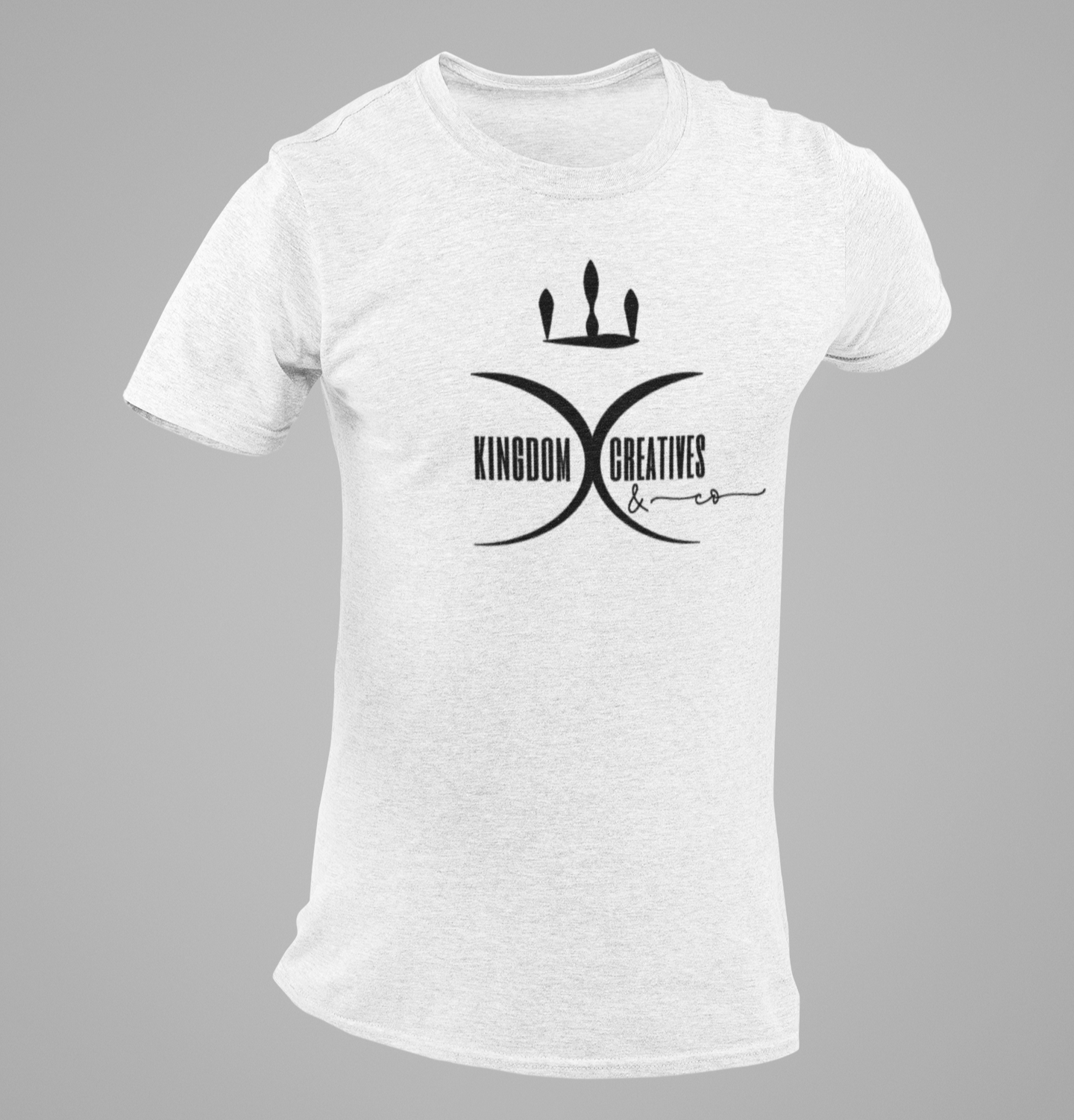 White t-shirt with the Kingdom Creatives & Co. logo on a gray background